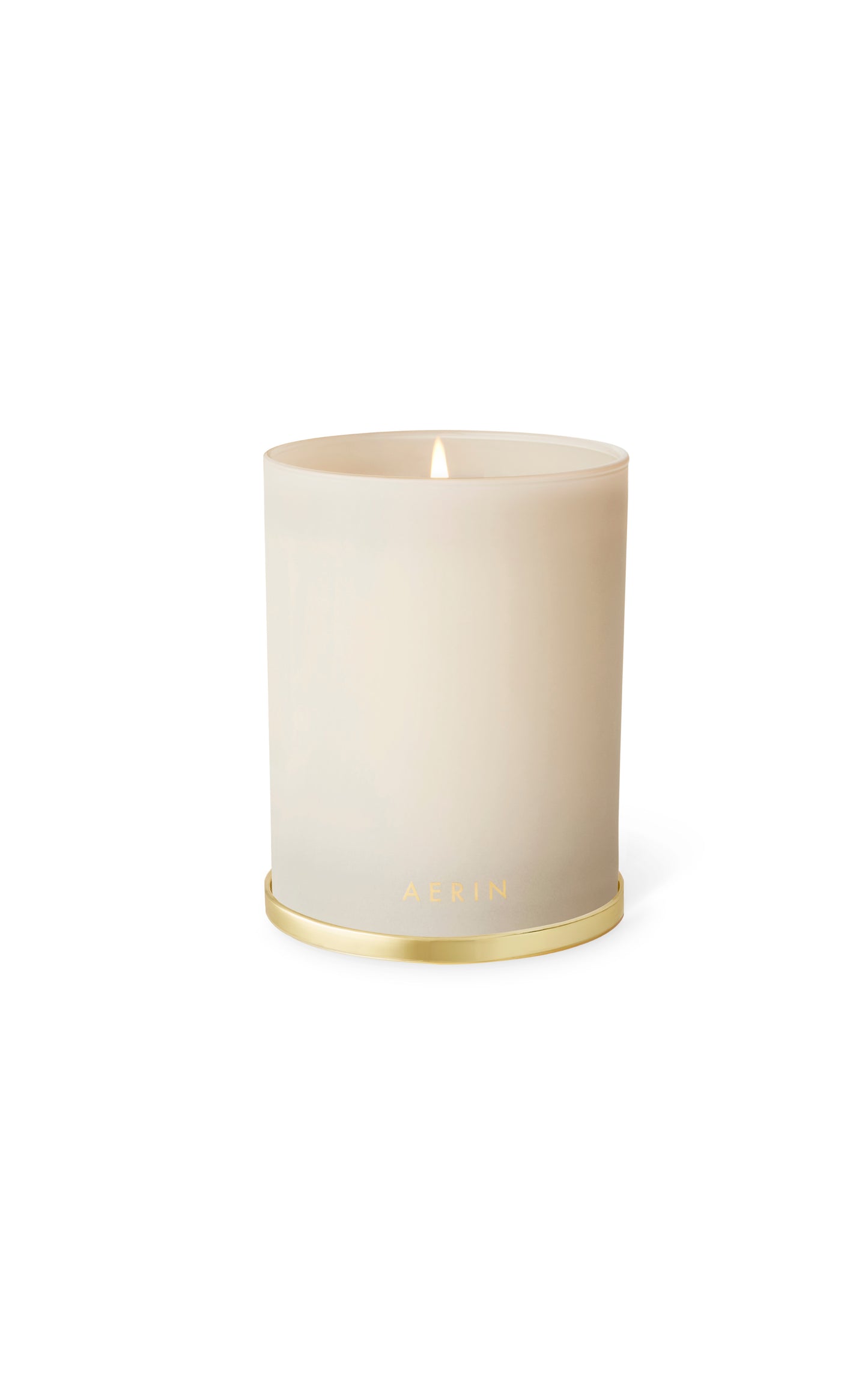 White candle with gold base on a white background
