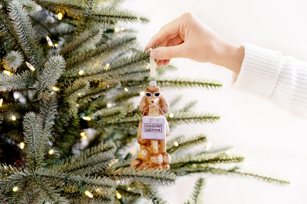 Gray Malin The Bergdorf Poodle Ornament hanging on Christmas ree