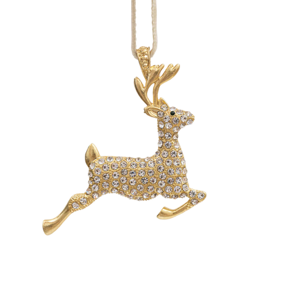 Gold deer-shaped holiday ornament with crystals on a white background