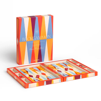 A colorful Backgammon game set with a matching box standing upright and the open game board laid out below on a clean white background. The box and board feature bold geometric stripes in orange, blue, purple yellow, and cream, with red dice visible inside the playing area.