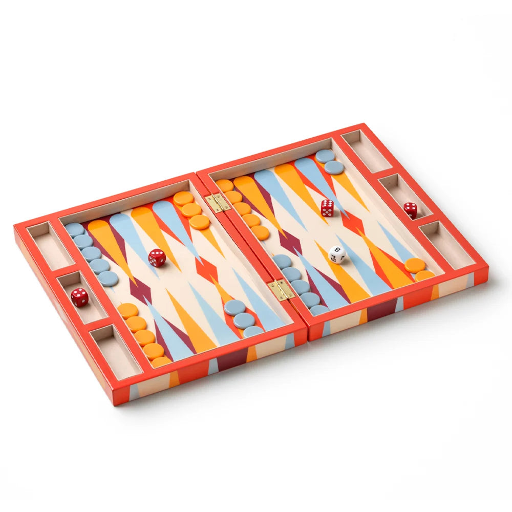Colorful backgammon board with pieces and dice on a white background