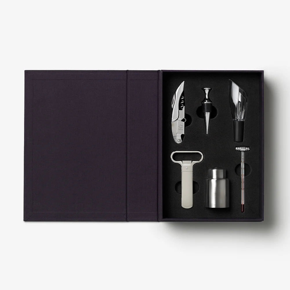 Set of wine opening tools in a black box on a white background