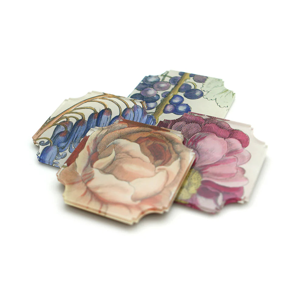 Set of floral-patterned coasters on a white background